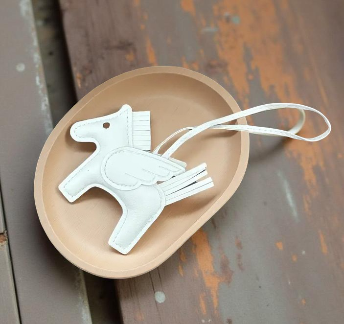 White Pegasus Charm | تعليقة بيغاسوس بيضاء